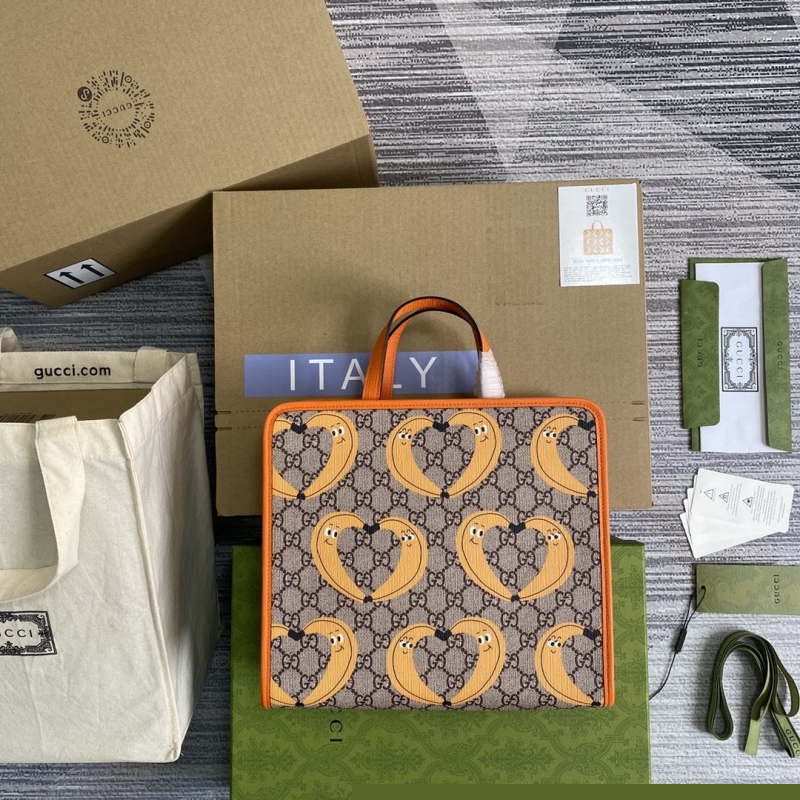 G*u*i shopping bags